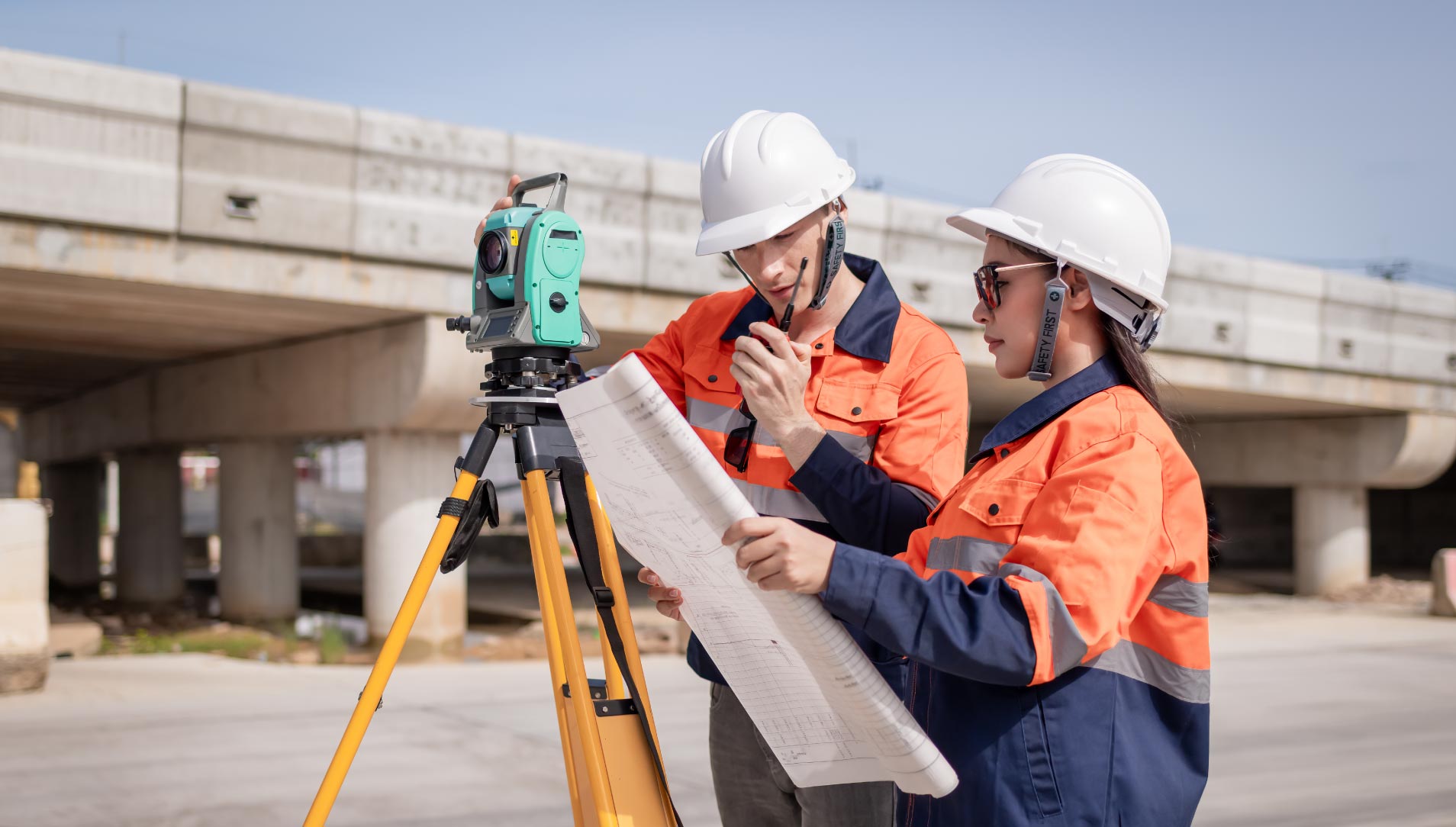 Surveyor recording high street façades for street scene survey